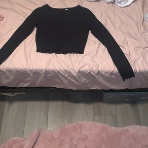 Black slightly cropped long sleeve shirt